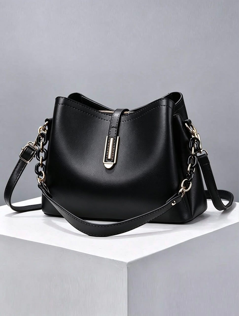 U leather bucket-style crossbody bag
