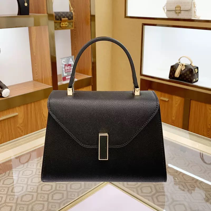 Structured trapezoid silhouette bag