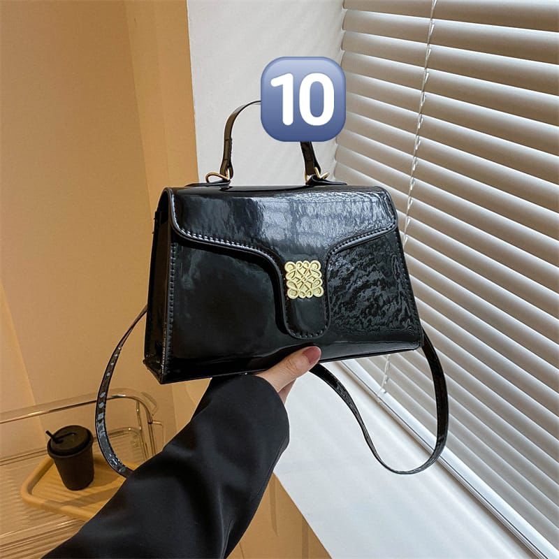 Glossy metallic handbag